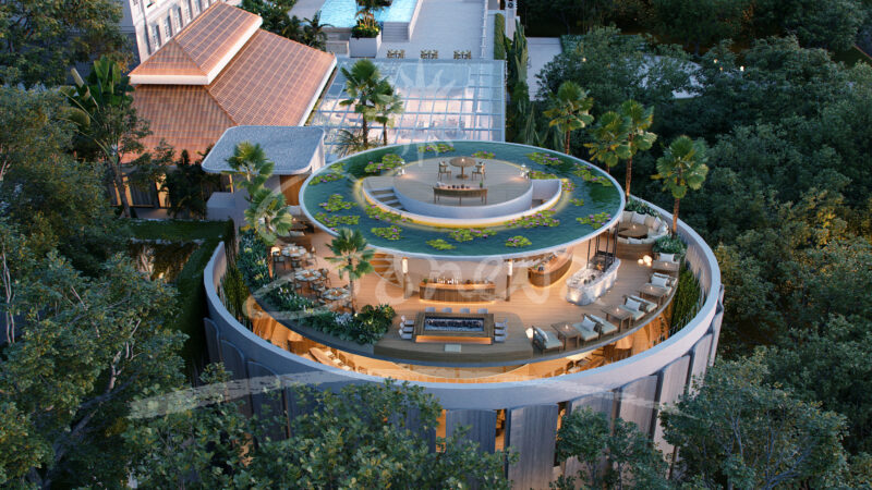 Aerial view of an elegant rooftop terrace with a circular design surrounded by lush greenery. The terrace, reminiscent of a Maldives luxury resort, features an outdoor seating area, tables, a central bar, and numerous plants, offering a luxurious and serene ambiance. Nearby buildings and more greenery are visible.